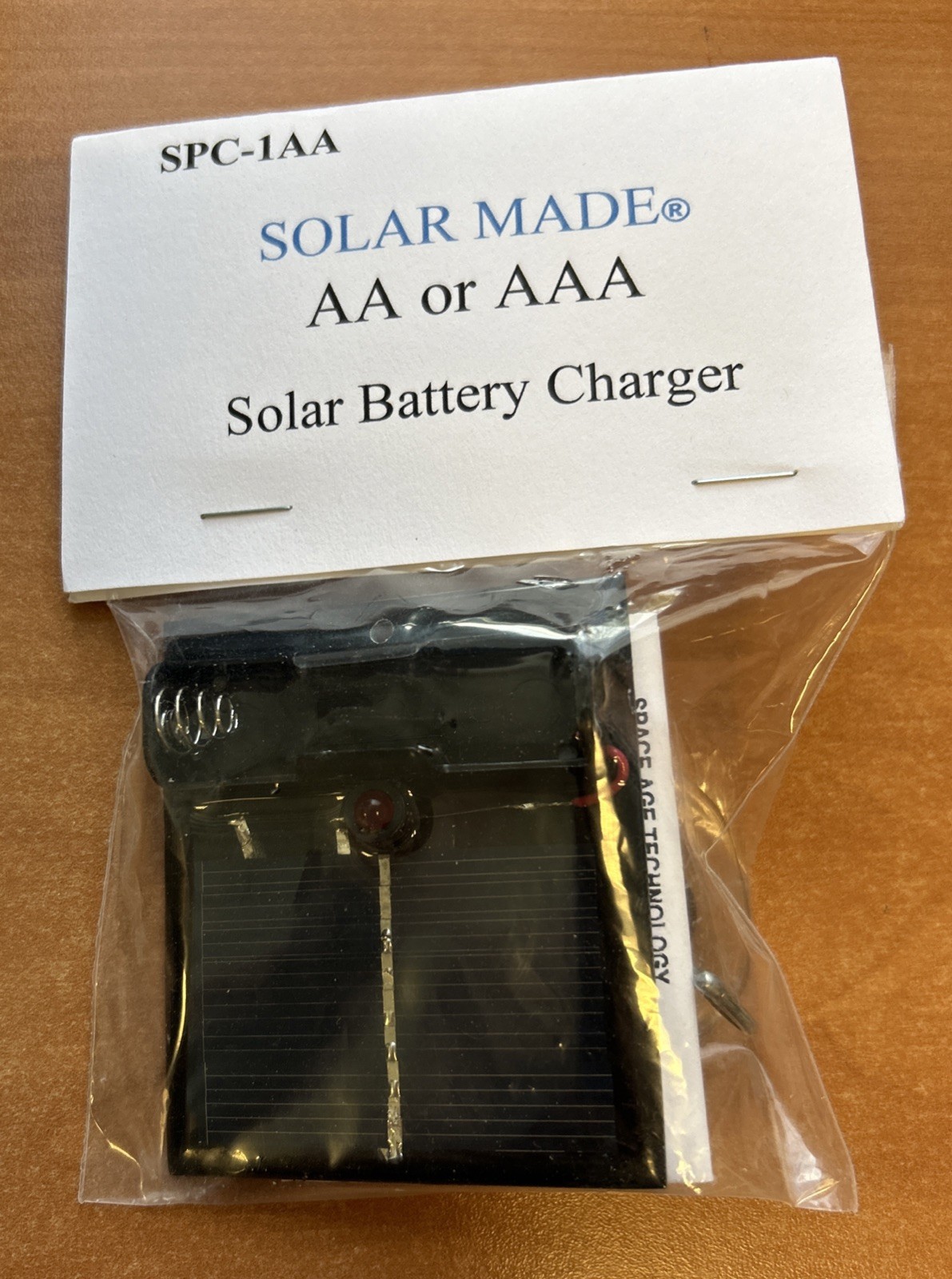 Compact Solar Made AA Or AAA Solar Battery Charger W/ Suction Cup Hook SPC-1AA