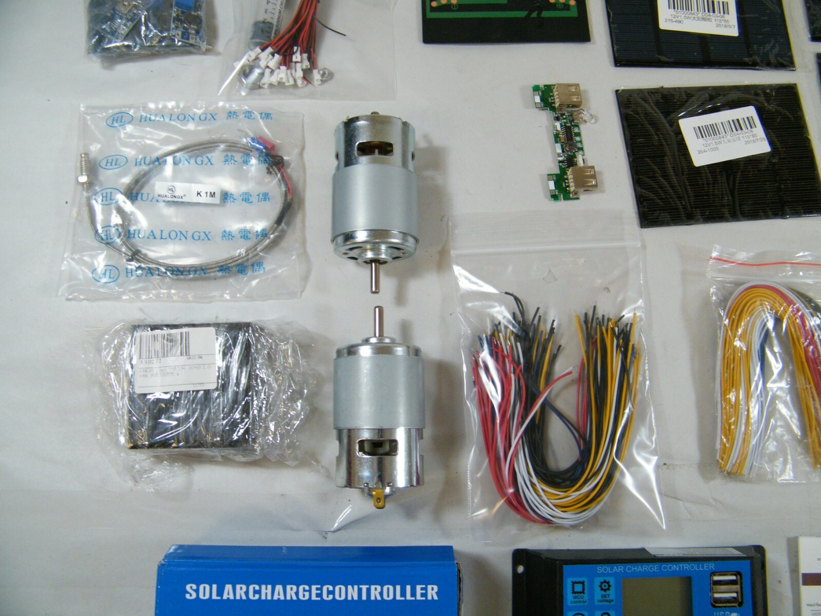 STAR SOLAR CONTROLLER, MINI SOLAR PANELS, WIRES, CASES, ETC, DIY PHONE CHARGER